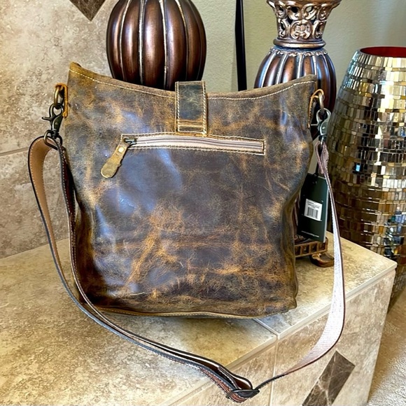 MYRA-HAZEL HUES LEATHER & HAIRON BAG
BOUTIQUE - Picture 3 of 4